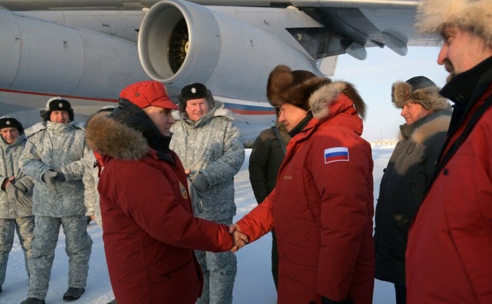 President Putin shakes hands with Defense Minister Sergey Shoigu at the airport on Aleksandra Land. To the right Sergey Ivanov and Sergey Donskoy. Photo: Kremlin