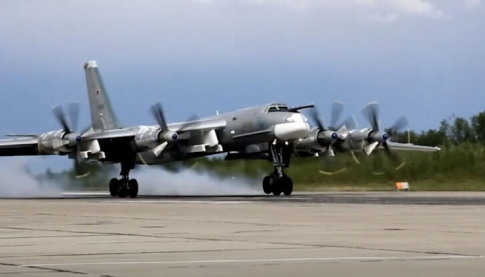 A Tu-95MS bomber landing at Olenya airfield about an hour drive south of Murmansk on the Kola Peninsula. Screenshot from video by Russia’s Ministry of Defense