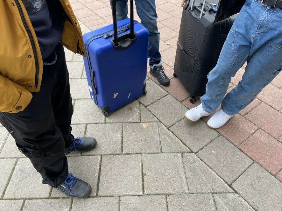 A group of young men from St. Petersburg waiting outside a hotel in Kirkenes. “I have nothing good to say about Putin,” says Nikitia (28). “That’s all there is to say about that.” Photo: Thomas Nilsen