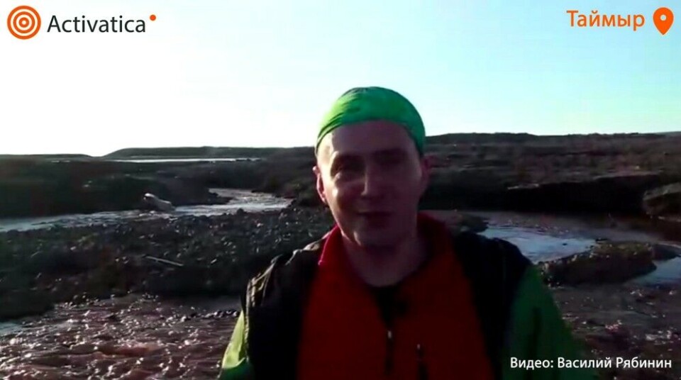 Environmentalist Vasily Ryabinin found plenty of oil in the water during a recent visit to Norilsk. Photo: Screenshot from video by Activatica