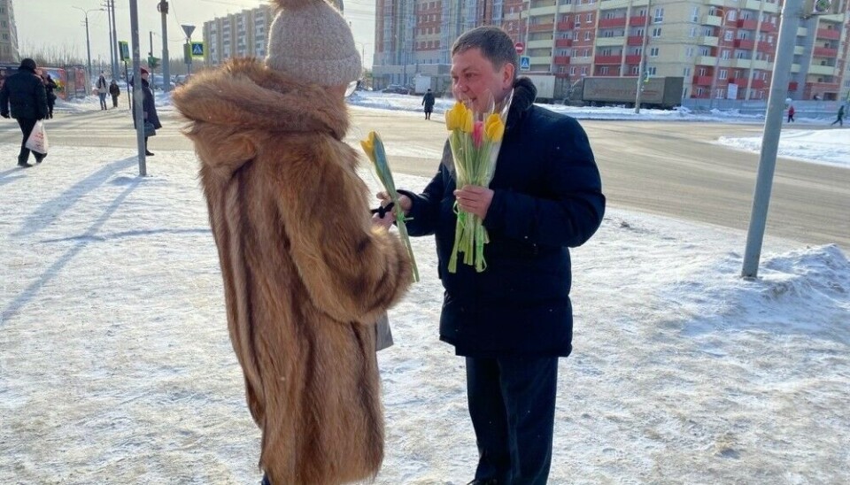 Members of the 'United Russia' party presenting flowers to women on the streets of Arkhangelsk city on March 7, 2024, to celebrate International Women's day on March 8, 2024. Photo: VKontakte page of the 'United Russia' Arkhangelsk office.