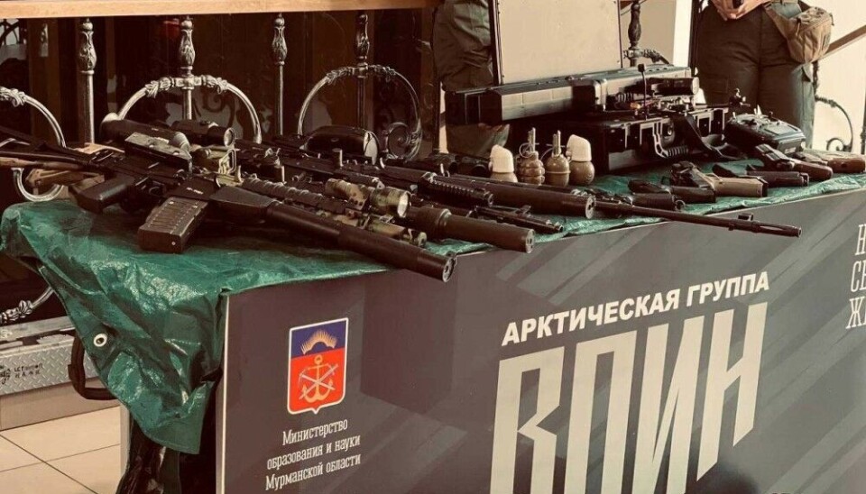 Weapons on display as Deputy Minister of Enlightenment Bugaev meets with representatives of the Voin Center in Murmansk. Photo: Voin Murmansk on VK