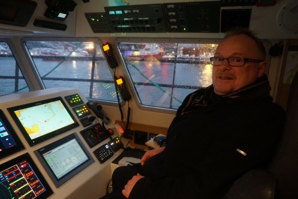 Norway's Minister of Fisheries, Per Sandberg, in the Captain's seat on board 'Karoline.' Photo: Thomas Nilsen