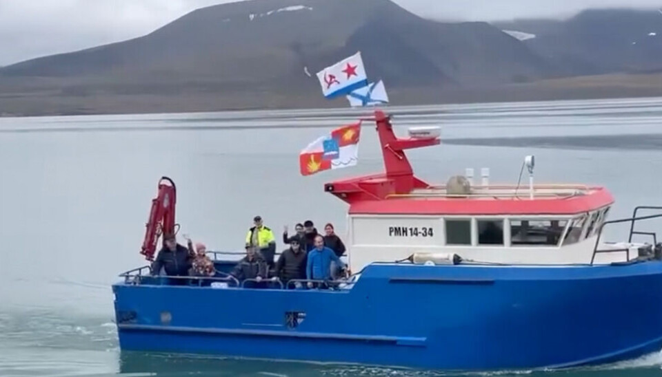 The small ship 'RMN 14-34' belongs to Russia's state-owned company Arktikugol and is normally sailing with passengers and cargo between Longyearbyen and Barentsburg. On July 31 this year, the vessel sailed first in the improvised Navy Day Parade in Grønfjorden outside Barentsburg. Screenshot from video