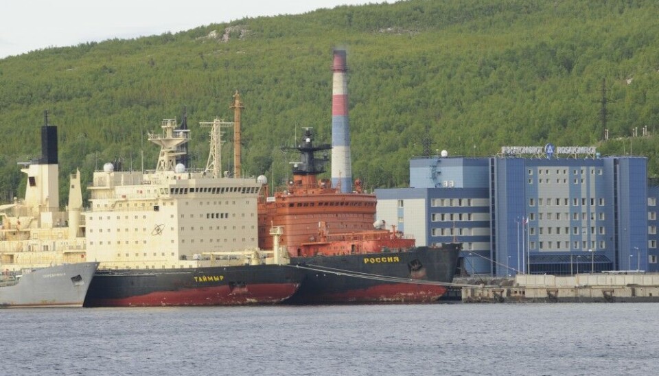 Atomflot service base with nuclear-powered icebreakers. The 'Serebryanka' (grey), 'Taymyr' (yellow), and the old 'Rossiya' (red). Photo: Thomas Nilsen