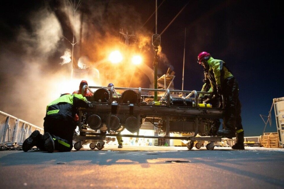 Freezing cold, but safely on deck: Mooring with acoustic and oceanographic instruments recovered from the Beaufort Sea, north of Alaska. Photo: Norwegian Coast Guard