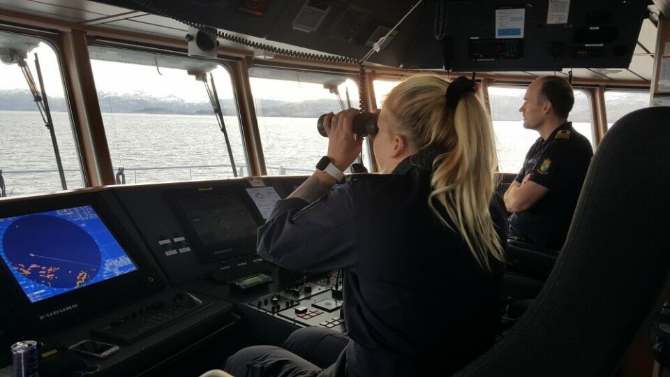 Crew members on watch from the bridge on board the coast guard vessel “KV Farm”, here sailing a few hundred meters from Norway’s maritime border to Russia. Photo: Thomas Nilsen