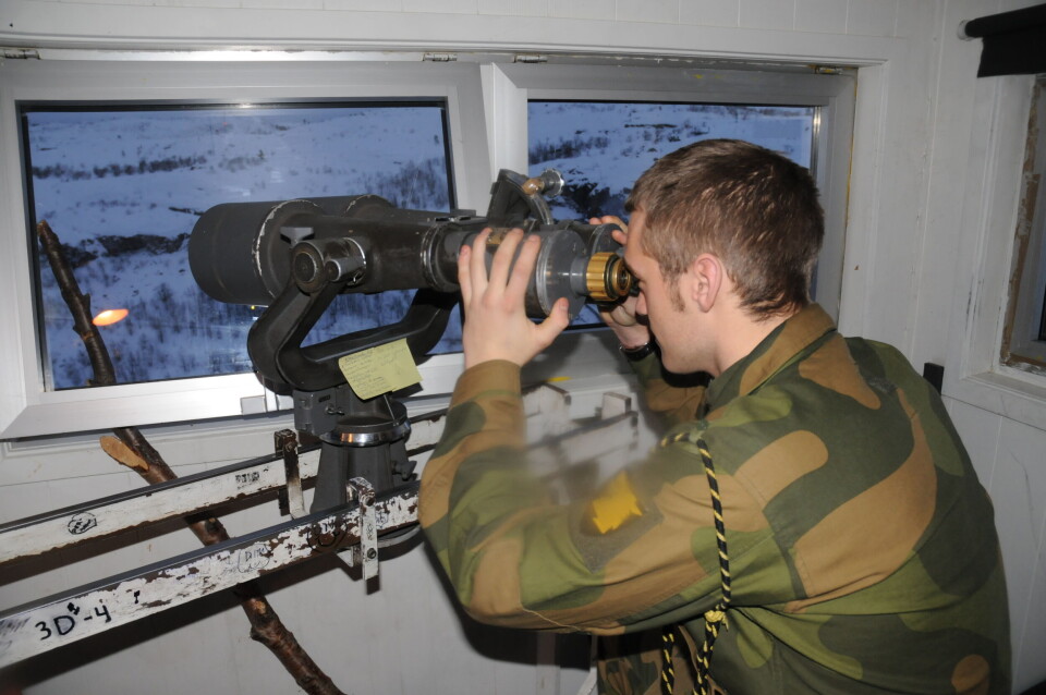 A Norwegian border guard in one of the many watchtowers along the 196 kilometres border between Norway and Russia in the north. Photo: Thomas Nilsen