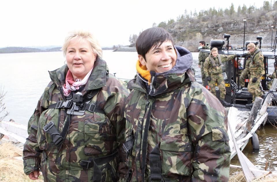 Solberg and Eriksen Søreide on Pasvik river tour. Photo from Facebook / Government.