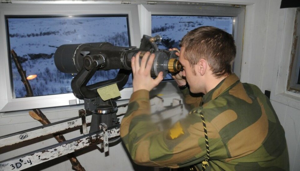 A Norwegian border guard in one of the many watchtowers along the 198 kilometres border between Norway and Russia in the north. Photo: Thomas Nilsen