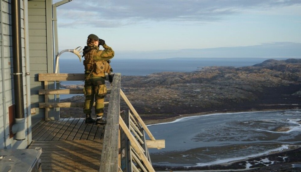 Binoculars, but no drones. Norwegian border guards keep eyes on neighboring Russia. Here from the northernmost observation post on the coast to the Barents Sea. Russia’s Sredny Peninsula visible in the horizon. Photo: Thomas Nilsen