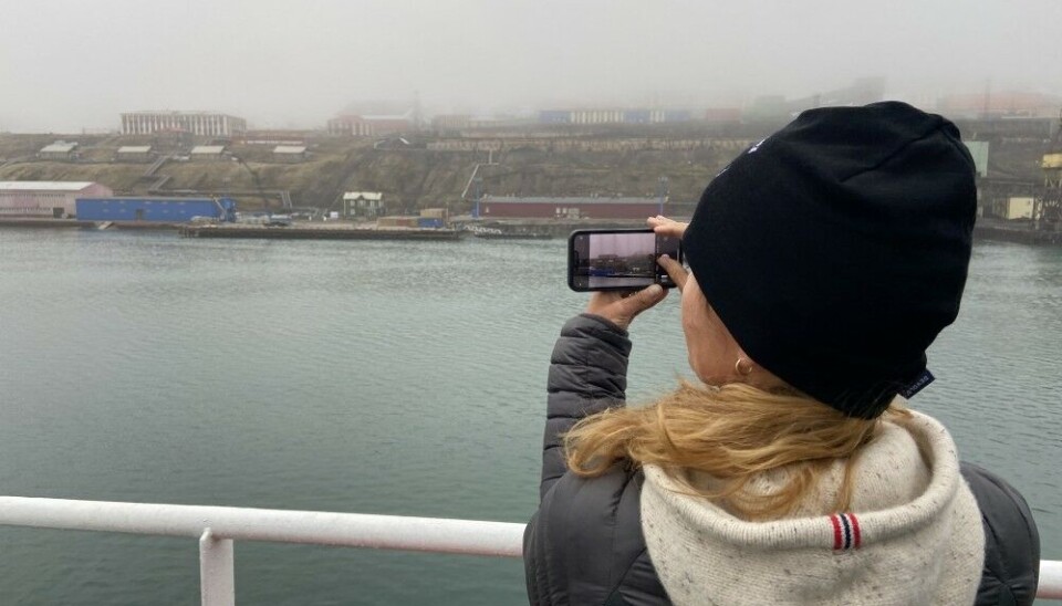 Hidden in the fog: Barentsburg seen from the seaside. Photo: Thomas Nilsen