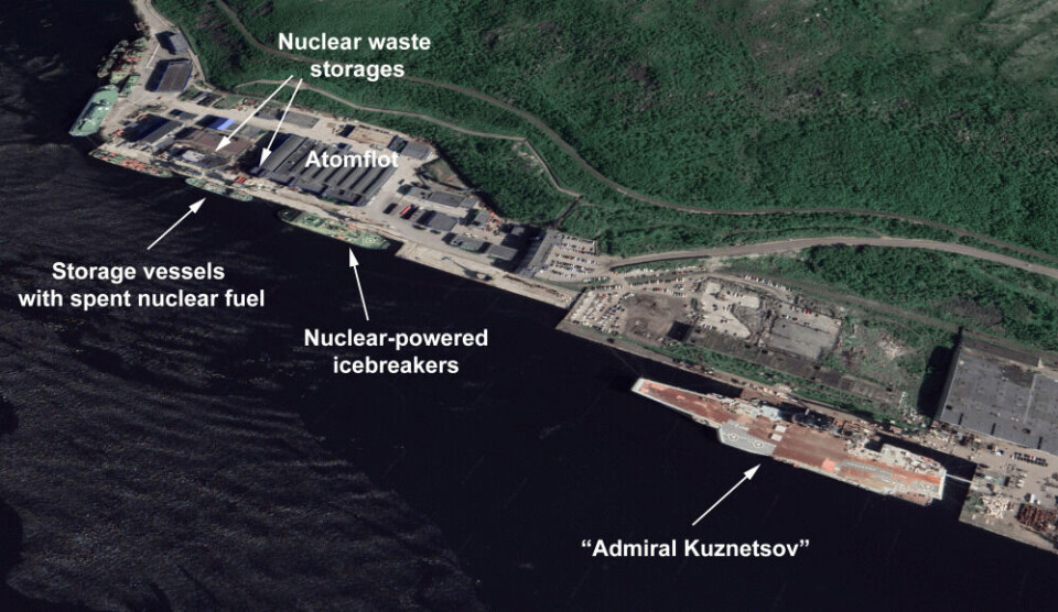 This satellite image shows how close the carrier is to Atomflot. Although most nuclear-powered icebreakers nowadays are sailing the Kara Sea / Yamal areas, there are still four service ships with radioactive- and nuclear waste at port as well as several storage sites onshore for radioactive waste and casks with spent nuclear fuel. The distance from the fire onboard “Admiral Kuznetsov” to the possible nearest vessel at Atomflot is about 400 meters. Satellite image by Google Earth / Barents Observer