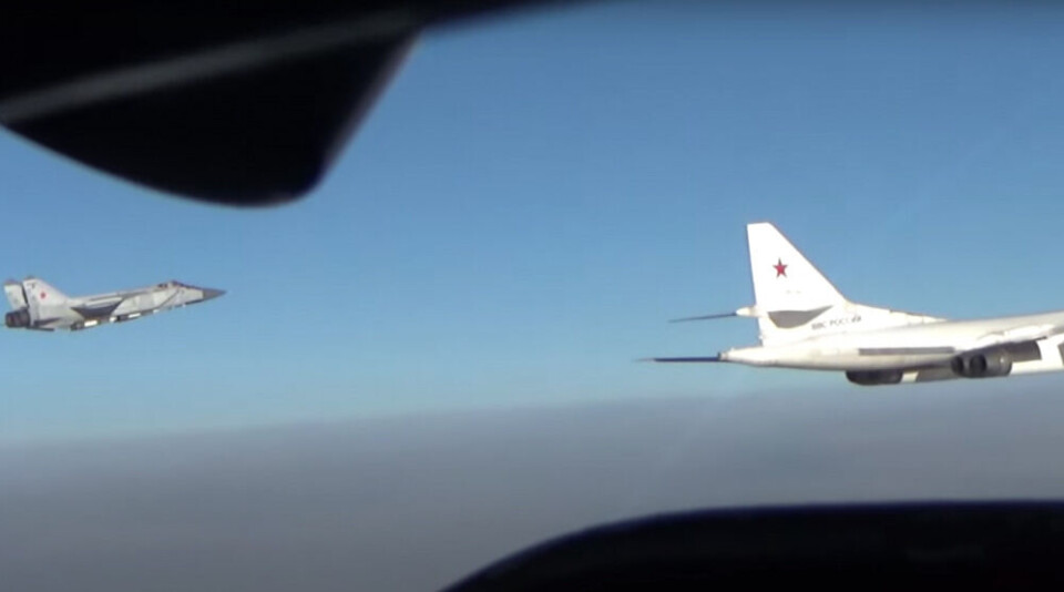 The pair of Tu-160 strategic bombers were escorted by MiG-31 over the Barents Sea. Screenshot from Defense Ministry video
