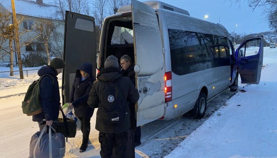 Russians put their bags in the van which will take them to Murmansk. Photo: Olesya Krivtsova