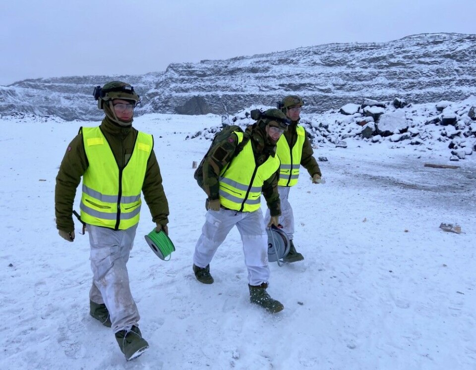 Walking to a safe distance before blowing up the anti-tank mine. Photo: Thomas Nilsen