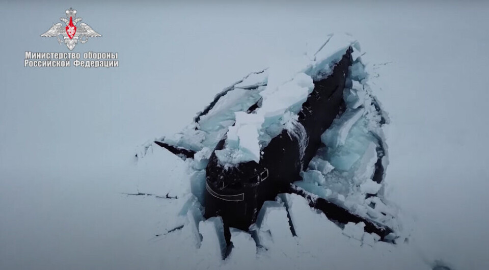 The sail of one of the Delta-IV class ballistic missile submarines breaking through the ice. Screenshot from Defense Ministry video