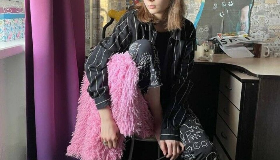 A photo of Olesya made for her by a New York Times reporter. One can see an electronic bracelet on her leg, designed to track her movements.