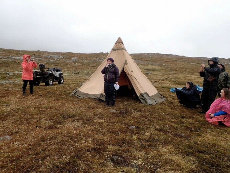 Sara Ajnnak from the Svaipa Sámi village welcomed the delegation to the moratorium area of Svaipa, Semisjaur–Njarg and Grans with a yoik and a speech. – This is our land, and we’re going to fight for it as long as there are plans for a mine here, she said. Photo: Marianne Hofman