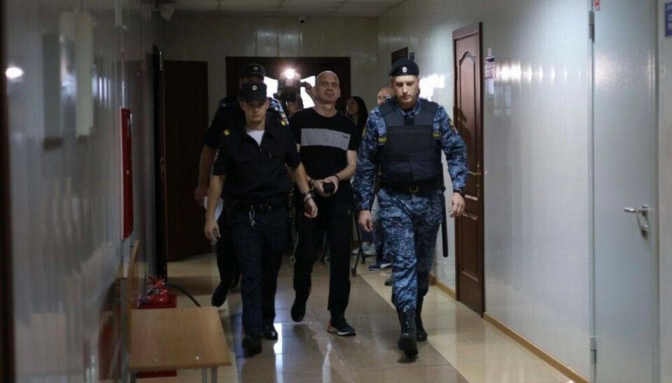 Editor Mikhail Afanasyev entering the court room Thursday morning in the Siberian city of Abakan. Photo via Nikolay Rybakov.