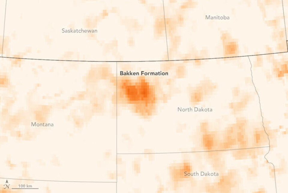 Nitrogen dioxide, an air pollutant produced by the combustion of fossil fuels, shows elevated levels of the gas over the the Bakken Formation of North Dakota. Credits: NASA’s Earth Observatory