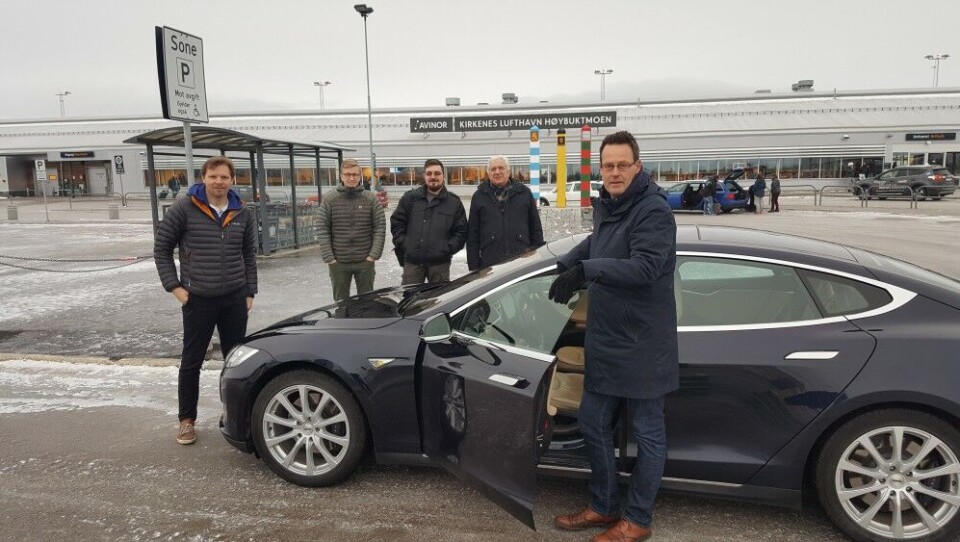 Bellona team with a Tesla car at Kirkenes airport. Nils Bøhmer in front. Local entrepreneur Finn Helge Lunde (left), Bellona's Christian Eriksen, Yury Sergeyev and Andrey Zolotkov. Photo: Thomas Nilsen
