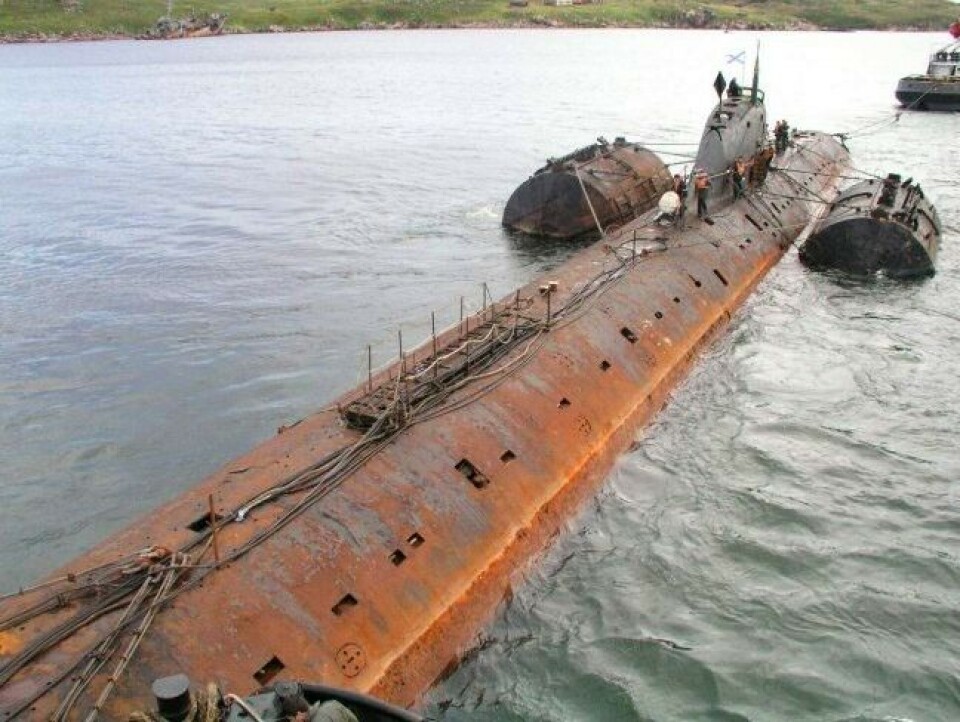 Last photo: submarine 'K-159' fastened to the pontoons supposed to keep it floating during towing on August 28, 2003. The same night, it sunk in the Barents Sea. It is now one of the objects that are to be lifted. Photo: Courtesy of Bellona Foundation
