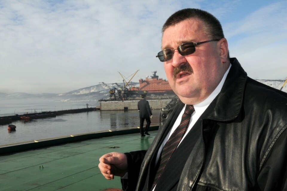 Rosatomflot Director Vyacheslav Ruksha with one of the nuclear powered icebreakers in the floating dock in the background. Photo: Thomas Nilsen