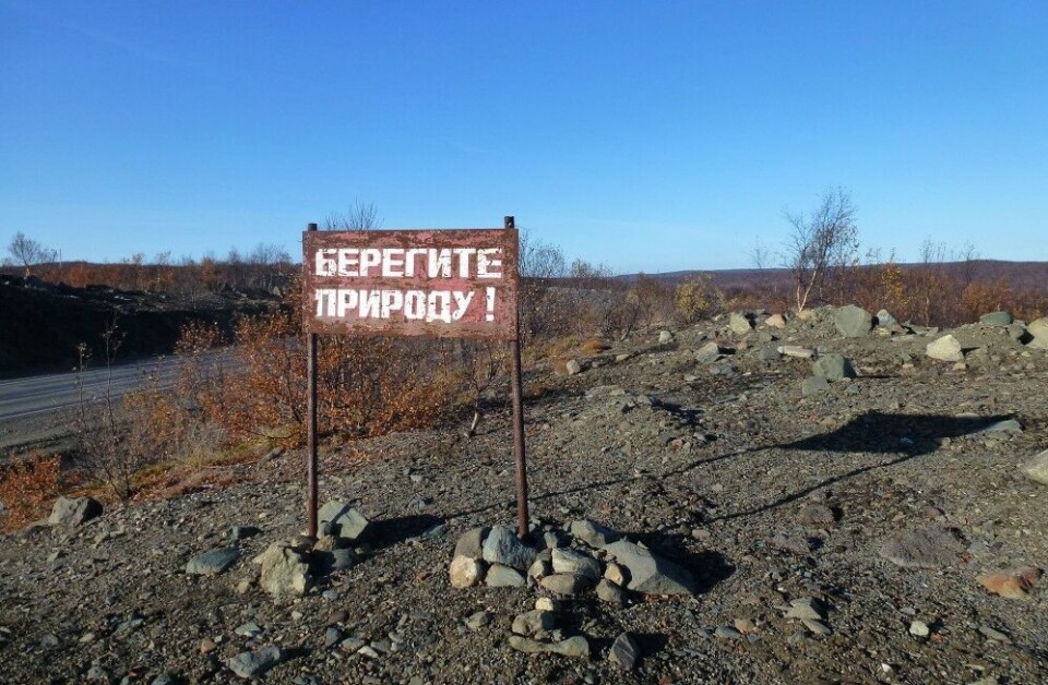 'Save the nature', says a sign placed in a Russian tundra area seriously affected by industrial pollution. Photo: Atle Staalesen