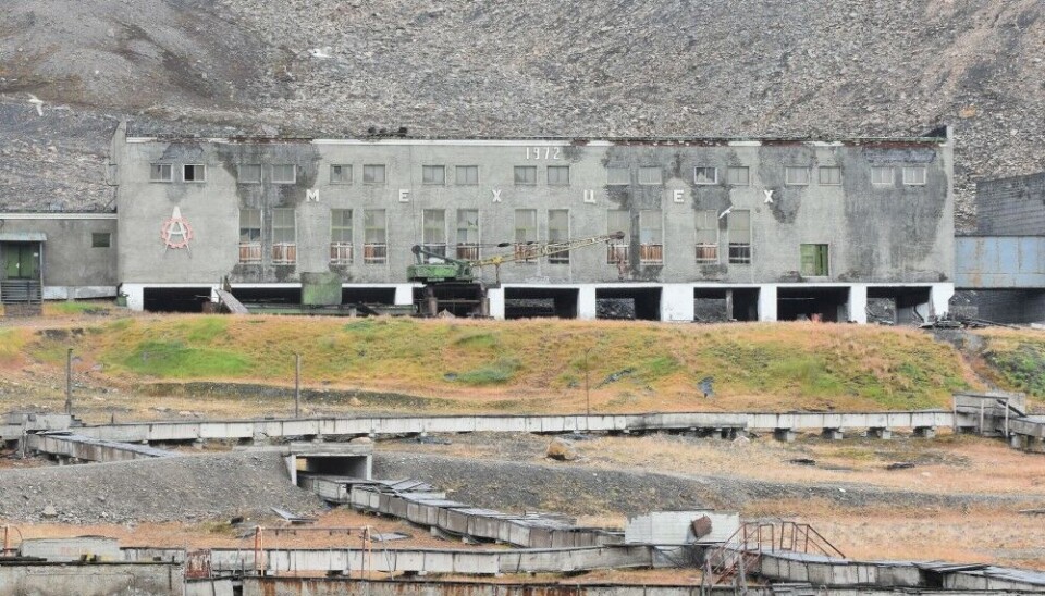 Abandoned mechanical workshop near the closed coal mine in the settlement of Pyramiden at Svalbard. Buildings here are at risk of falling apart over the thawing permafrost. Photo: Thomas Nilsen