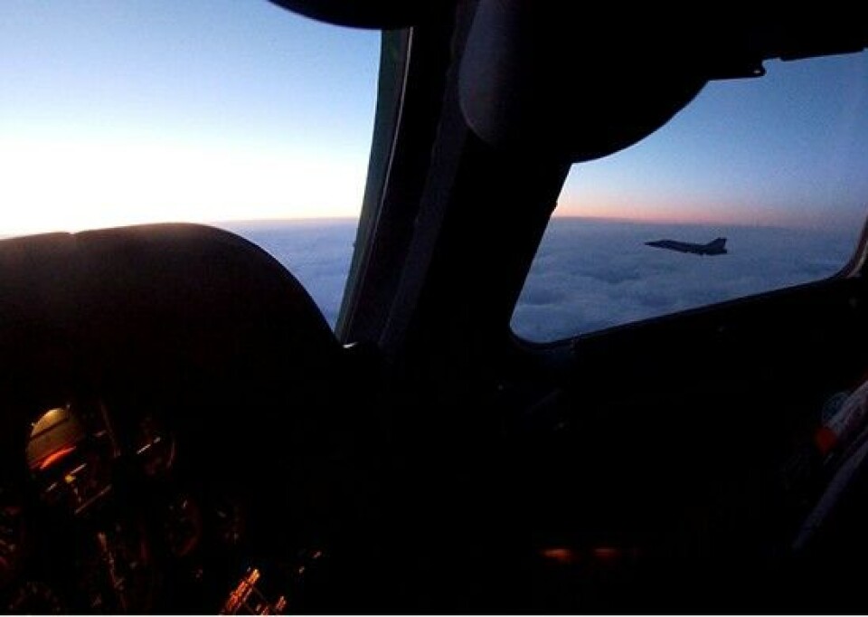 One of the Northern Fleet's fighter jets seen from the cockpit of a Tu-160 strategic bomber flying over the Arctic. Photo: Press Service of the Defense Ministry