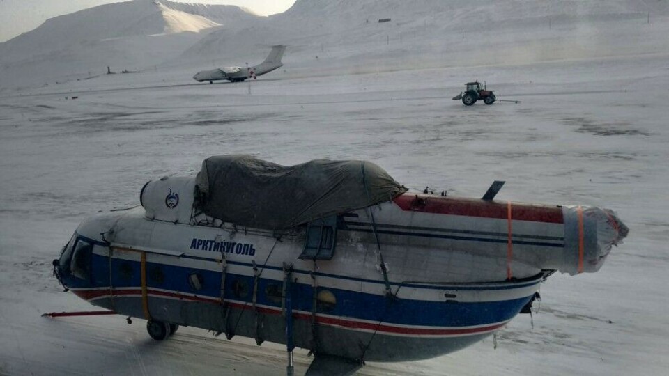 Retired helicopter is taken back to mainland. Photo courtesy by Timofey Rogozin, Grumant Arctiv Travel Company