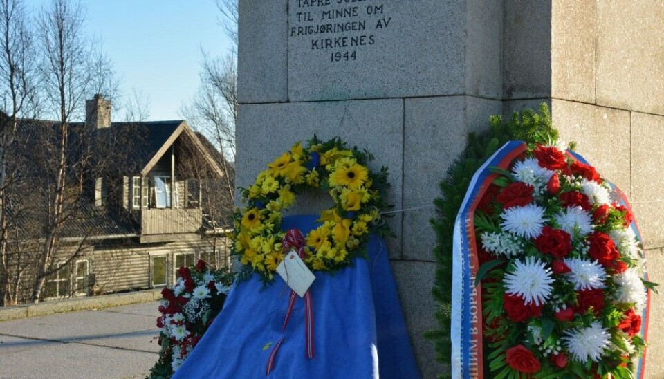 Wreaths in Ukrainian colors and Russian colors side-by-side at the Liberation Memorial in Kirkenes. Few hours after the ceremony, the Russian wreaths disappeared and it is so far not known who took them. Photo: Georgii Chentemirov