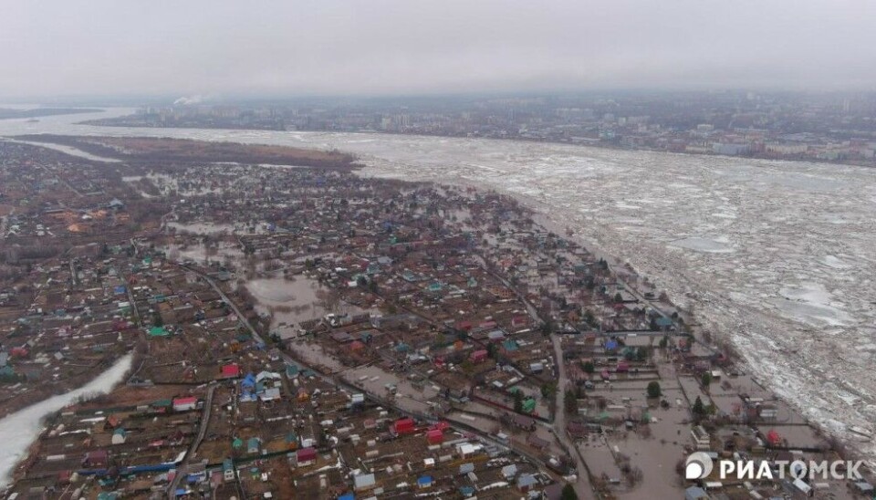 Rising waters in the Tom River with banks flooded in the city of Tomsk. A few kilometers further north in the horizon is the closed nuclear city of Seversk (formerly known as Tomsk-7), home to one of the world's largest dump-sites for radioactive waste. Photo courtesy of RIA Tomsk