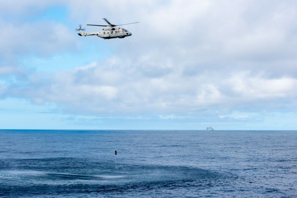 A Dutch Navy NH-90 helicopter raise up its sonar sensor while conducting Anti-Submarine Warfare Exercise (CASEX) during Dynamic Mongoose 18. NATO Photo by FRA N WO Christian Valverde