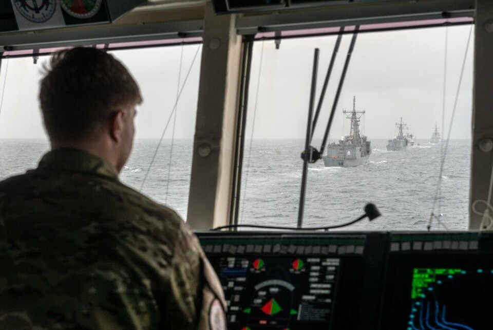 HDMS Niels Juel's Navigation Officer lines up the ship in the formation while executing manoeuvres drills during Dynamic Mongoose 18. NATO Photo by FRA N WO Christian Valverde