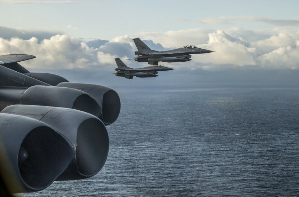 Two Norwegian F-16s follow the B-52 bomber. Photo: US Air Force Europe