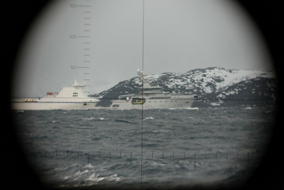 Coast of Finnmark, Barents Sea: Norwegian Coast Guard vessel 'KV Harstad' and RoRo 'Stena Forecaster' seen through Norwegian sub KNM Utsira's periscope. Photo: Norwegian Defence