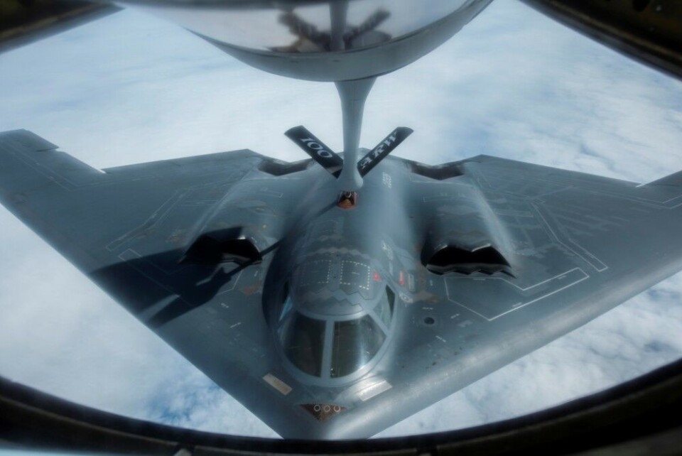 THURSDAY JUNE 18: A U.S. B-2 Spirit from the Whiteman Air Force Base in Missouri refueled mid-air with a KC-135 Stratotanker from England as part of the strategic bomber mission north of the Arctic Circle. Photo: U.S. Air Force / Airman 1st Class Joseph Barron