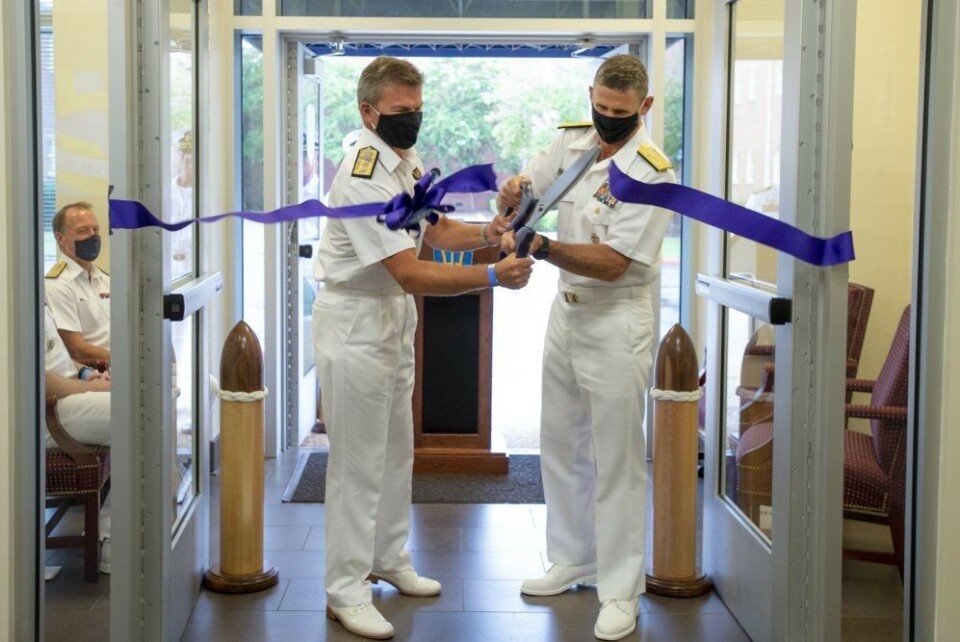 Vice Adm. Andrew Lewis, commander, Joint Force Command Norfolk (JFCNF) and U.S. 2nd Fleet, alongside Rear Adm. Andrew Betton, Deputy Commander, Joint Force Command Norfolk, cut the ribbon to commemorate JFCNF’s achievement of initial operational capability (IOC), Sept. 17. Photo: U.S. Navy by Mass Communication Specialist 1st Class Theodore Green