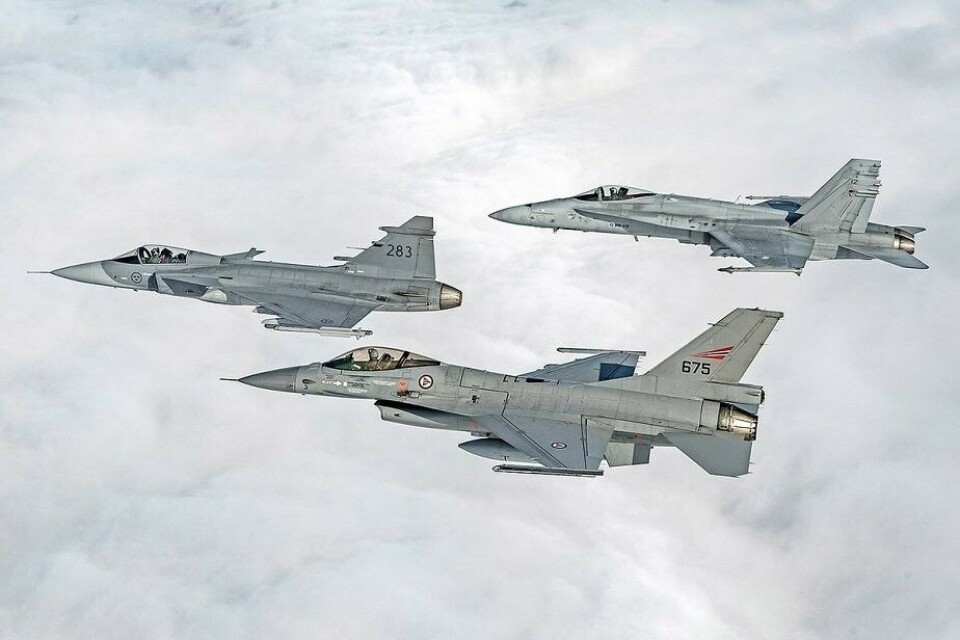 Nordic defence cooperation takes to the skies: F/A-18, JAS 39 and F-16 flying wing-by-wing. Photo: Finnish Air Force