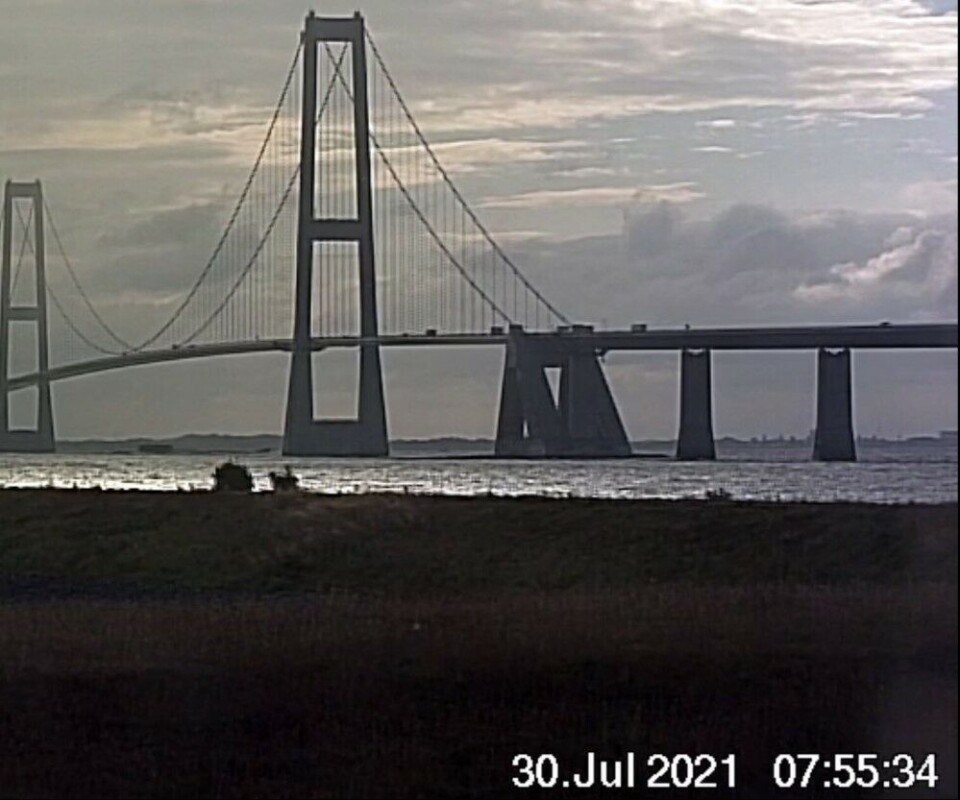 “Orel” sailed under the Great Belt Bridge in the morning on July 30. Webcam screenshot by @MatchlessMan410