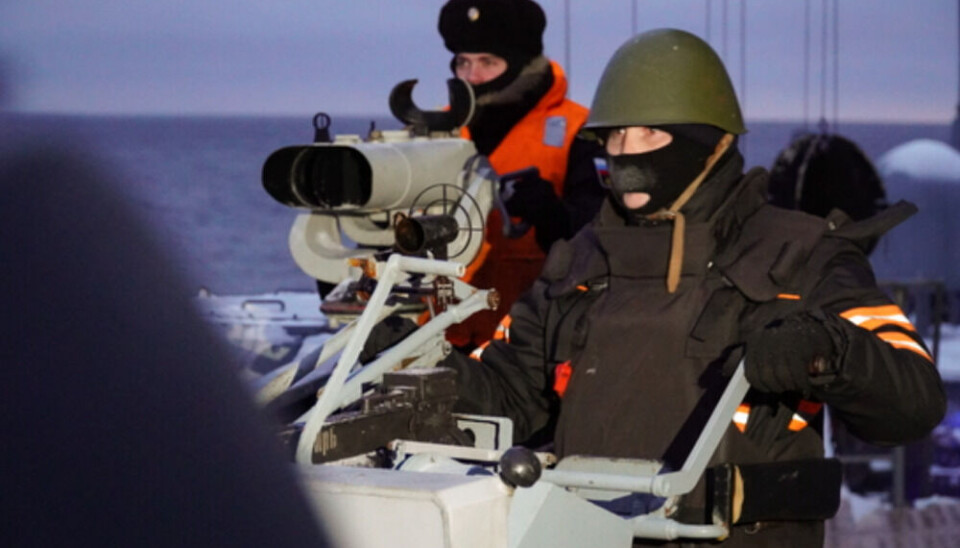 Crew manning the guns on the deck of frigate 'Admiral Gorshkov' during final training in the Barents Sea in December. Photo: Northern Fleet press service