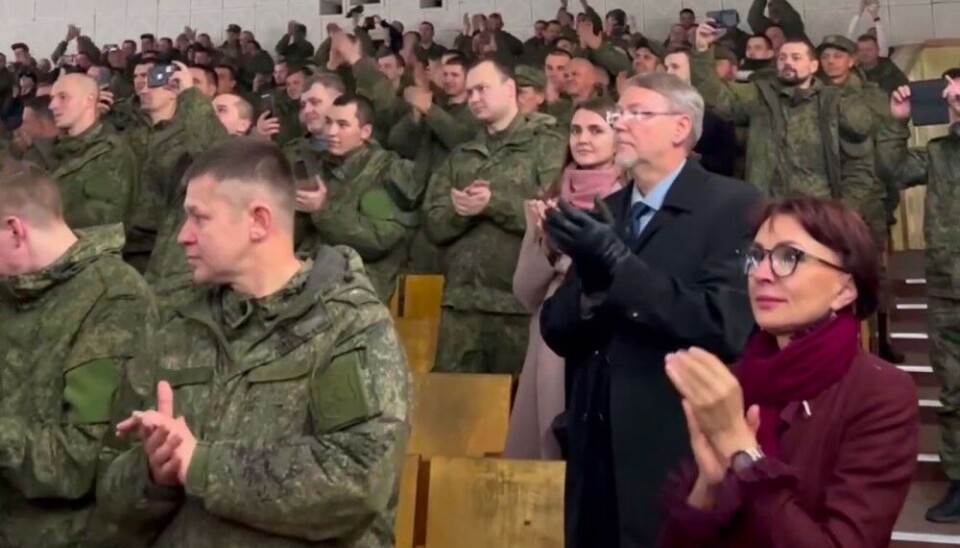 Tatiana Kusaiko (right) is Member of State Duma’s Defense Committee. Behind her, Andrei Vinogradov from the Znaniye Society. Screenshot of video