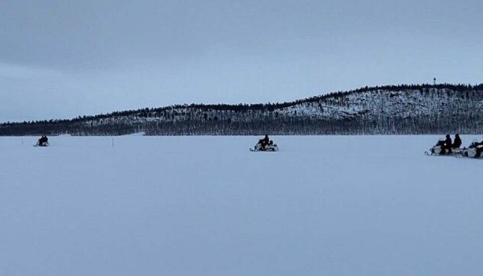 The group of NATO commanders made a snowmobile ride along the Pasvik River that forms the Norwegian-Russian border. An old FSB guard tower is seen on the top of the hill on the east side of the river banks. Photo: Thomas Nilsen