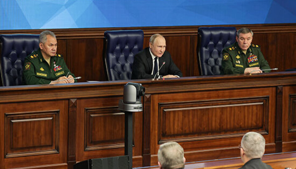 Defense Minister Sergei Shoigu, President Vladimir Putin and Chief of Staff of the Armed Forces General Valery Gerasimov at the December 21 meeting. Photo: Russian Defense Ministry