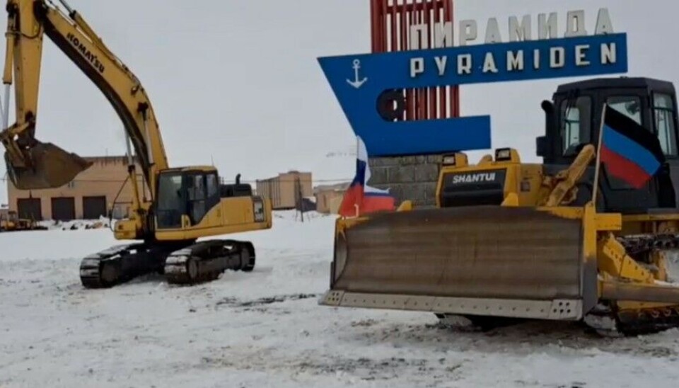 The flag of the so-called Donetsk People's Republic in 9th of May parade in Pyramiden, Svalbard. Screenshot of video by Trust Aktikugol