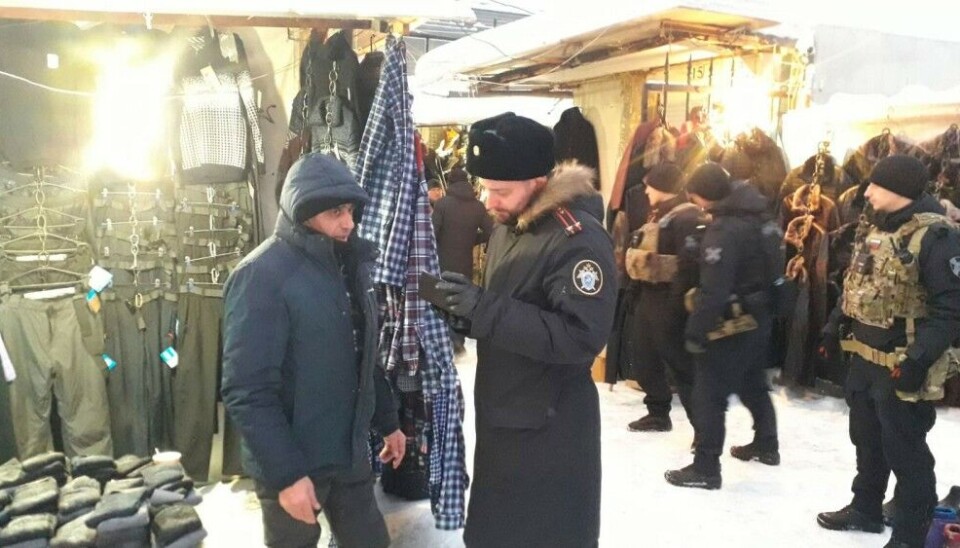 Military recruitment representatives raid market places and shopping centers in north Russian cities and town, among them the border town of Pechenga, in search of foreigners with Russian passports. Photo: Na Strazhe Zapolyariya on VK