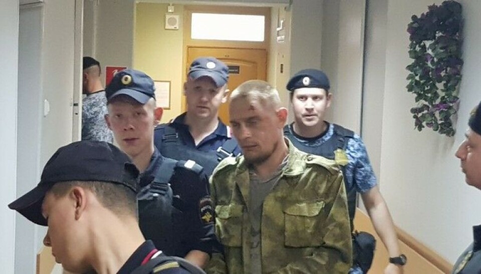 Игоря Софонова ведут на заседание по избранию меры пресечения. Фото: The Barents Observer