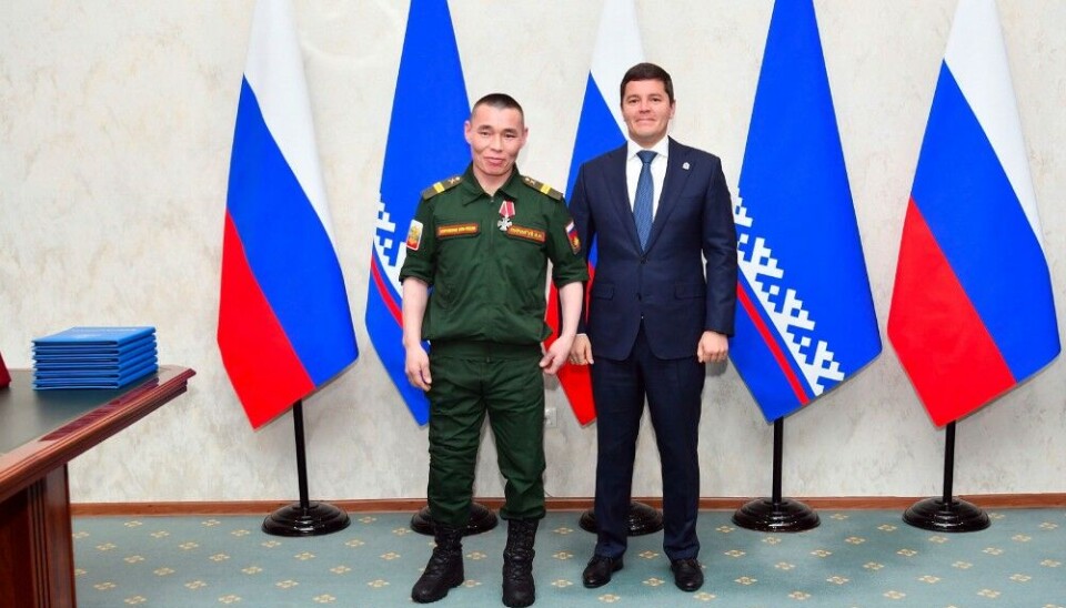 Warrior Ivan Pugunguy got a medal from regional Governor Dmitry Artyukhov. Photo: Viktor Yugay on VK